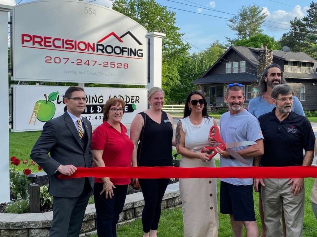 Precision roofing ribbon cutting