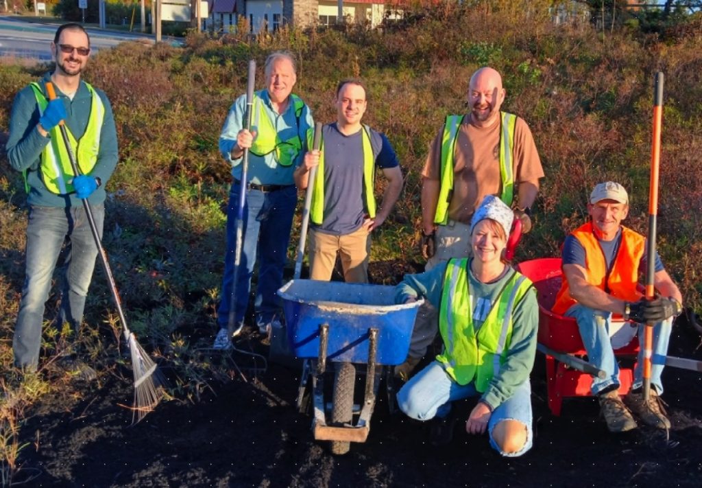 volunteers cleaning the rotary